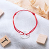 Bracciale in argento disco inciso e corda rossa